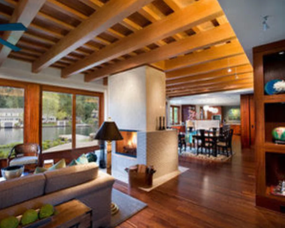 The interior of the Lake Oswego house includes ample windows affording views over the lake. Photo: Josh Partee