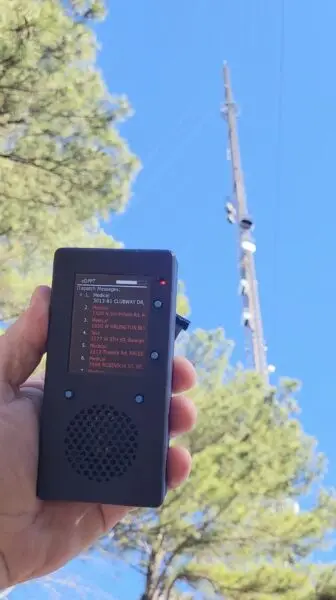 A handheld pager displays emergency alerts in a field test of an ATSC 3.0 public safety application.