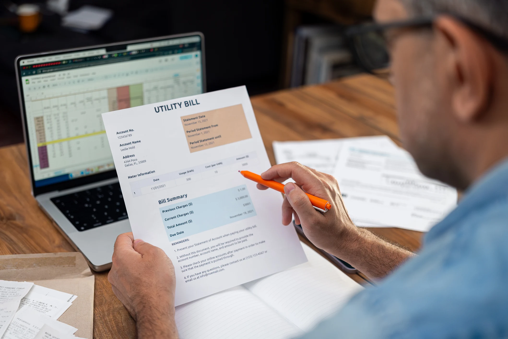 Man going over his monthly utility bill