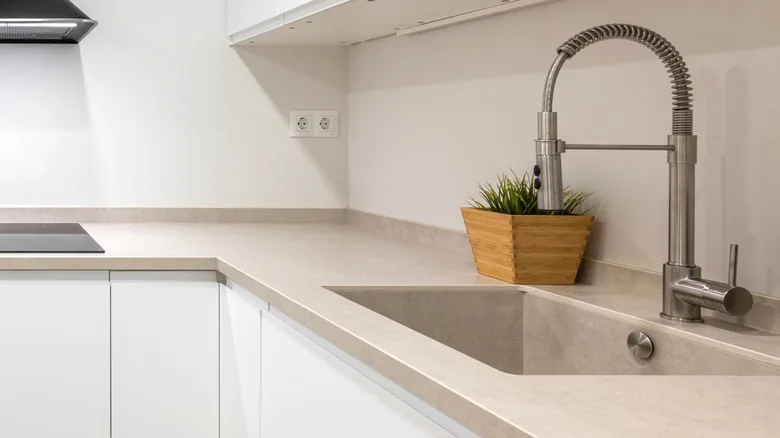 Stone integrated kitchen sink with pullout spray faucet