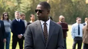 Sterling K Brown in 'Paradise,' a Hulu show, shown here wearing a suit and sunglasses outside