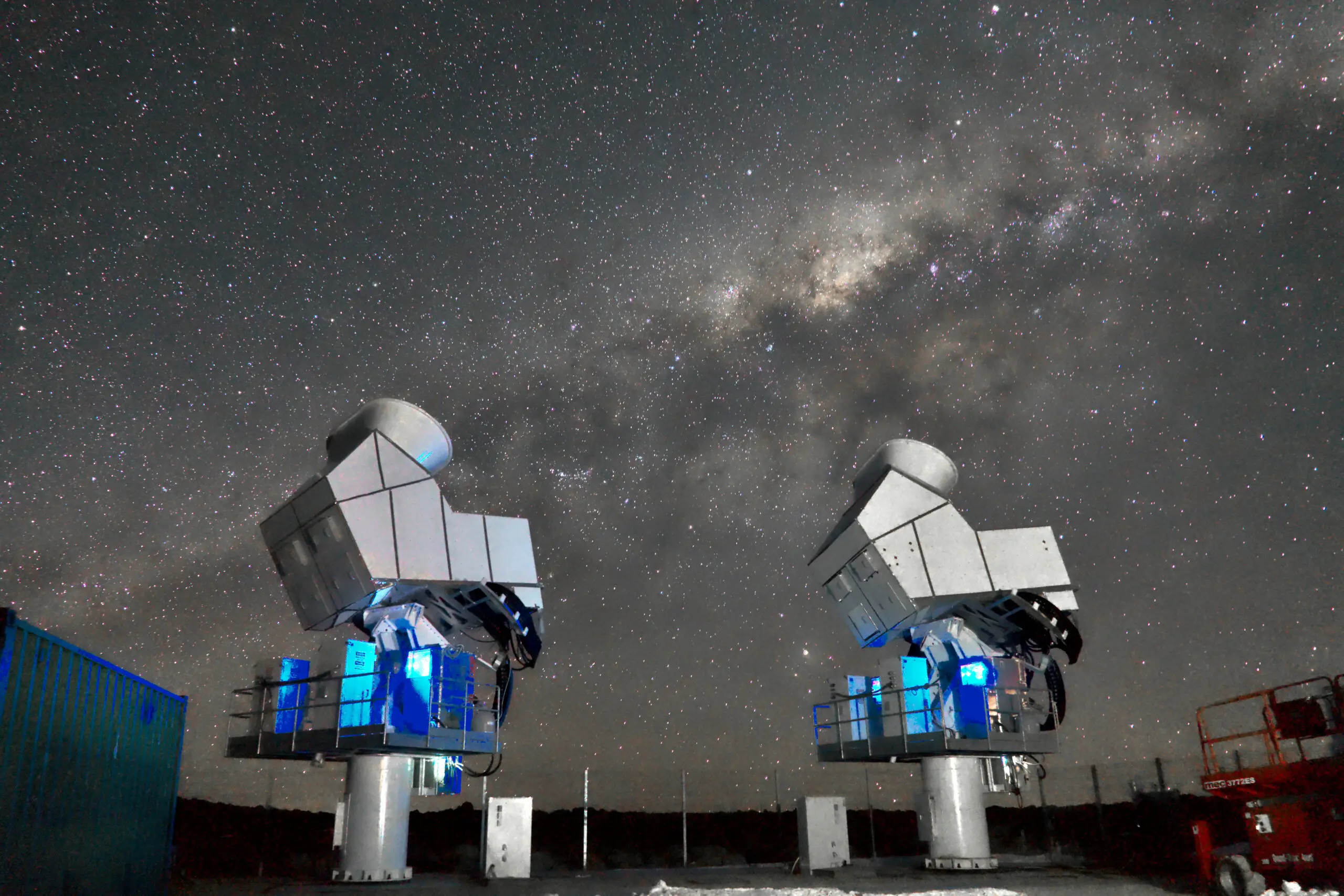 Two telescopes observe the night sky