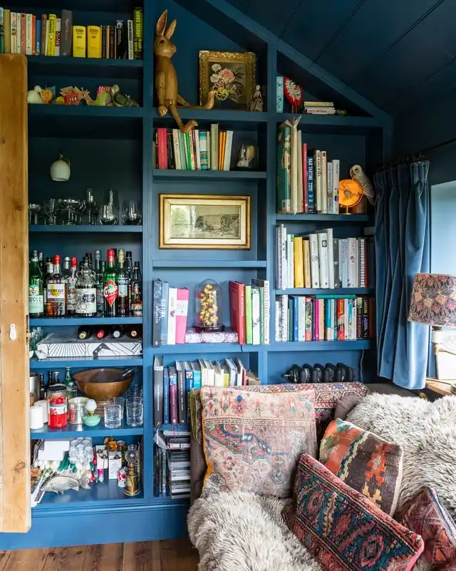 how to display art in a bookcase