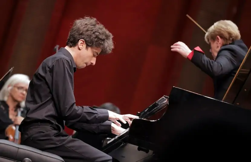 Pianist Vitaly Starikov performs with the Fort Worth Symphony Orchestra and guest conductor...