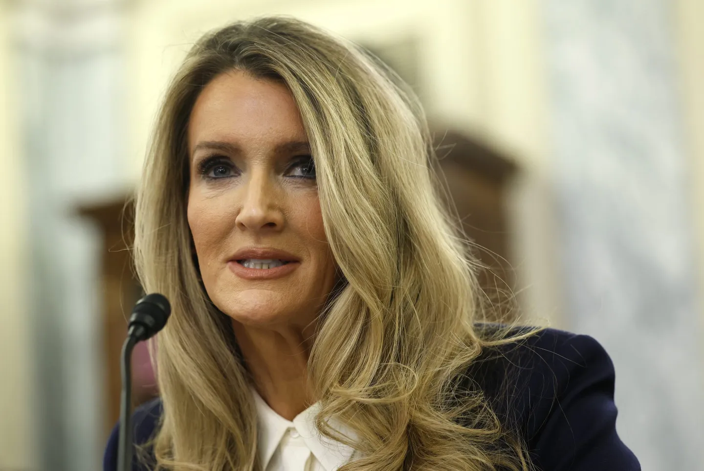 EXCLUSIVE: Kelly Loeffler, a Trump cabinet appointee who regularly appears on Newsmax, has quiet financial ties to its parent company