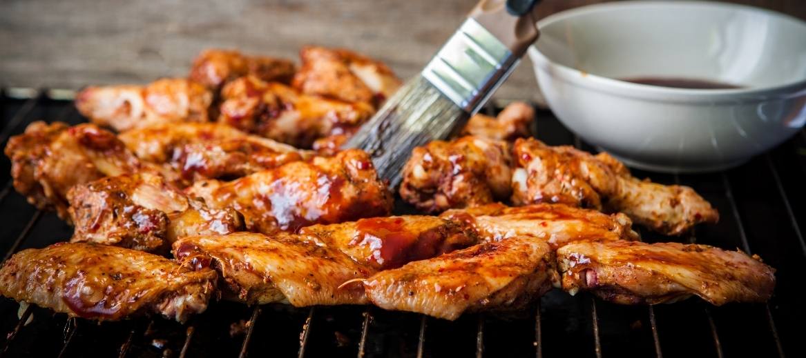 Infused with garlic, soy sauce, and honey, these barbecue chicken wings are grilled to perfection.