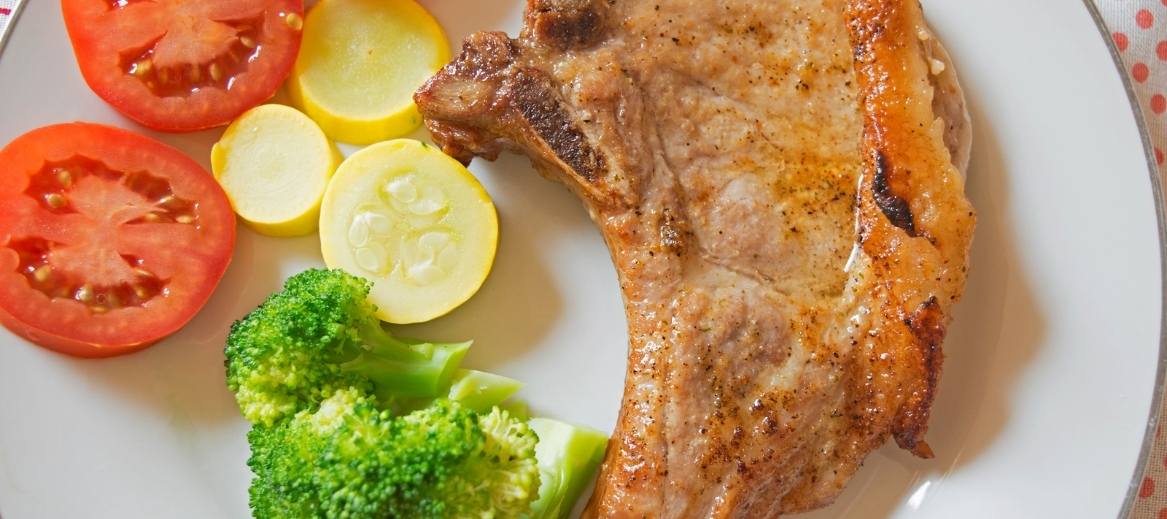 Cooking with just four ingredients, bone-in pork chops are roasted to perfection in the oven. Baked pork chops have never been so tender and juicy!