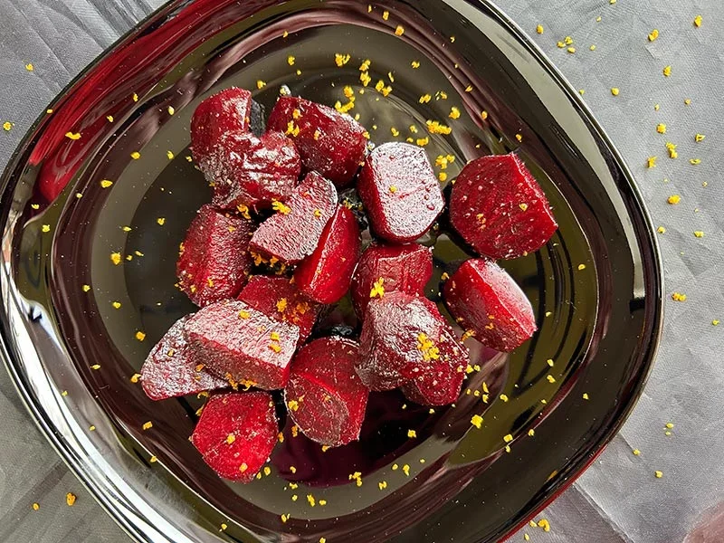 Some say that the sweetest red beets are those that are roasted in their skins, peeled, then quickly heated in a film of butter.