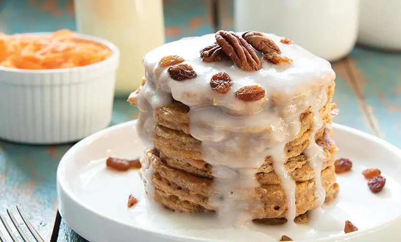 Vegan Carrot Cake Pancakes with Zesty Cream Cheese Icing Drizzle