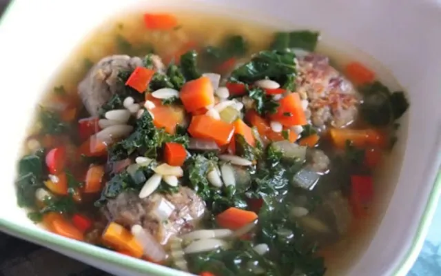 Kale And Orzo Soup With White Bean Balls