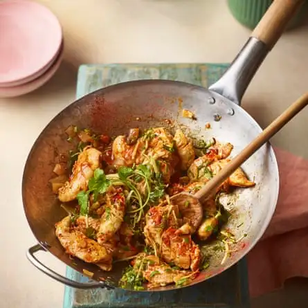 Stir-fried mini chicken fillets, with fresh ginger, green chilli, coriander and tomatoes