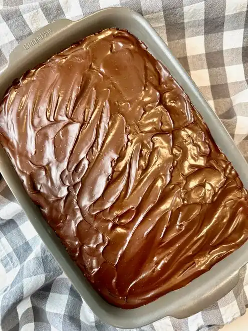 The hardest part of making chocolate eclair cake is waiting for it to chill overnight.