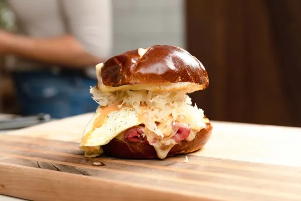 This St. Paddy's Day, try a corned beef sandwich served with a secret sauce and egg on a pretzel bun. Cookbook author Sonya Keister swears by the egg, sauerkraut and secret sauce combo. (Courtesy Patrick el Mouzawak)