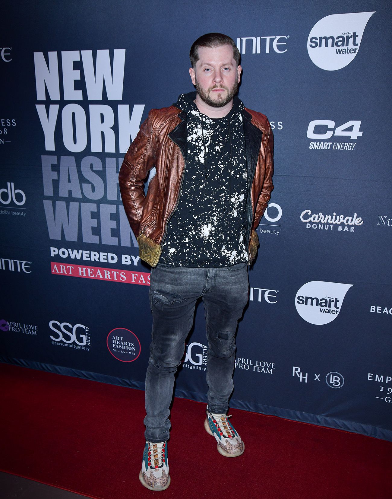 NEW YORK, NEW YORK - FEBRUARY 08: Lucky Lott arrives on the red carpet during New York Fashion Week Powered by Art Hearts Fashion at The Angel Orensanz Foundation on February 08, 2024 in New York City.  (Photo by Mark Gunter/Getty Images for Art Hearts Fashion)