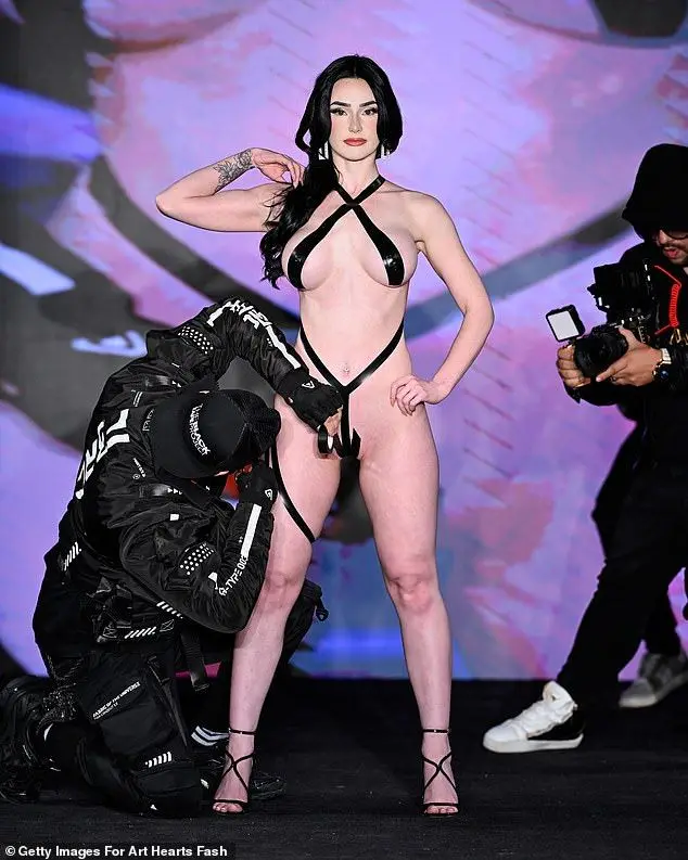 Joel Alvarez, creator of the Black Tape Project, could be seen taping a model during the show