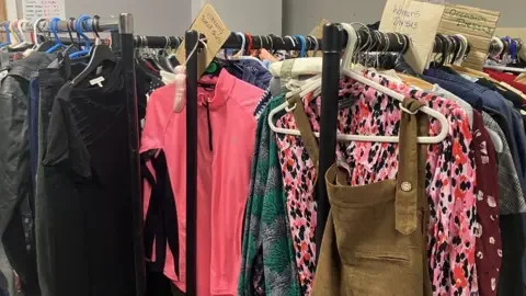 BBC Racks of clothing at Pembrokeshire FRAME