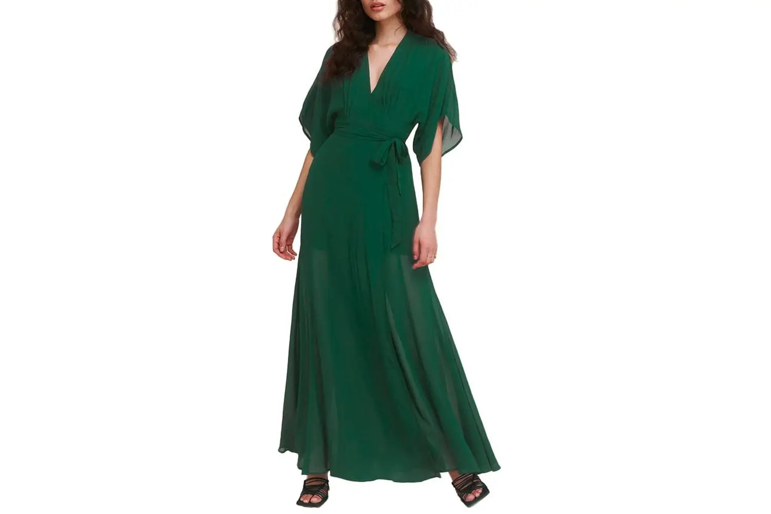 Woman wearing Reformation Winslow Dress in emerald