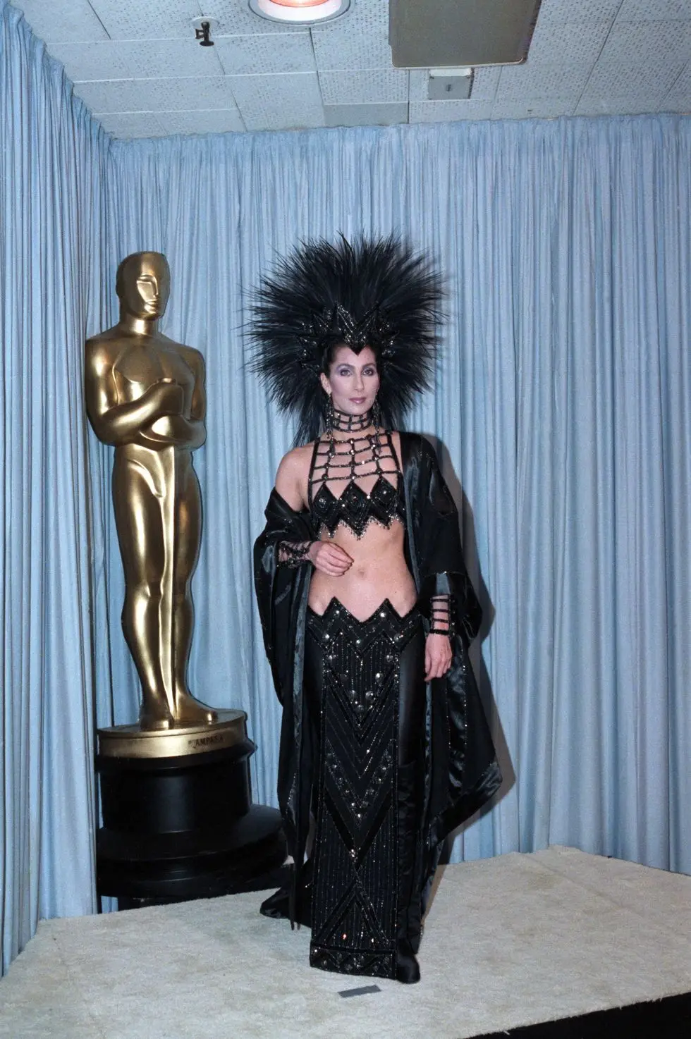 original caption 3241986 los angeles, ca cher is shown in a full length photo from backstage at the academy awards bpa 2 1857