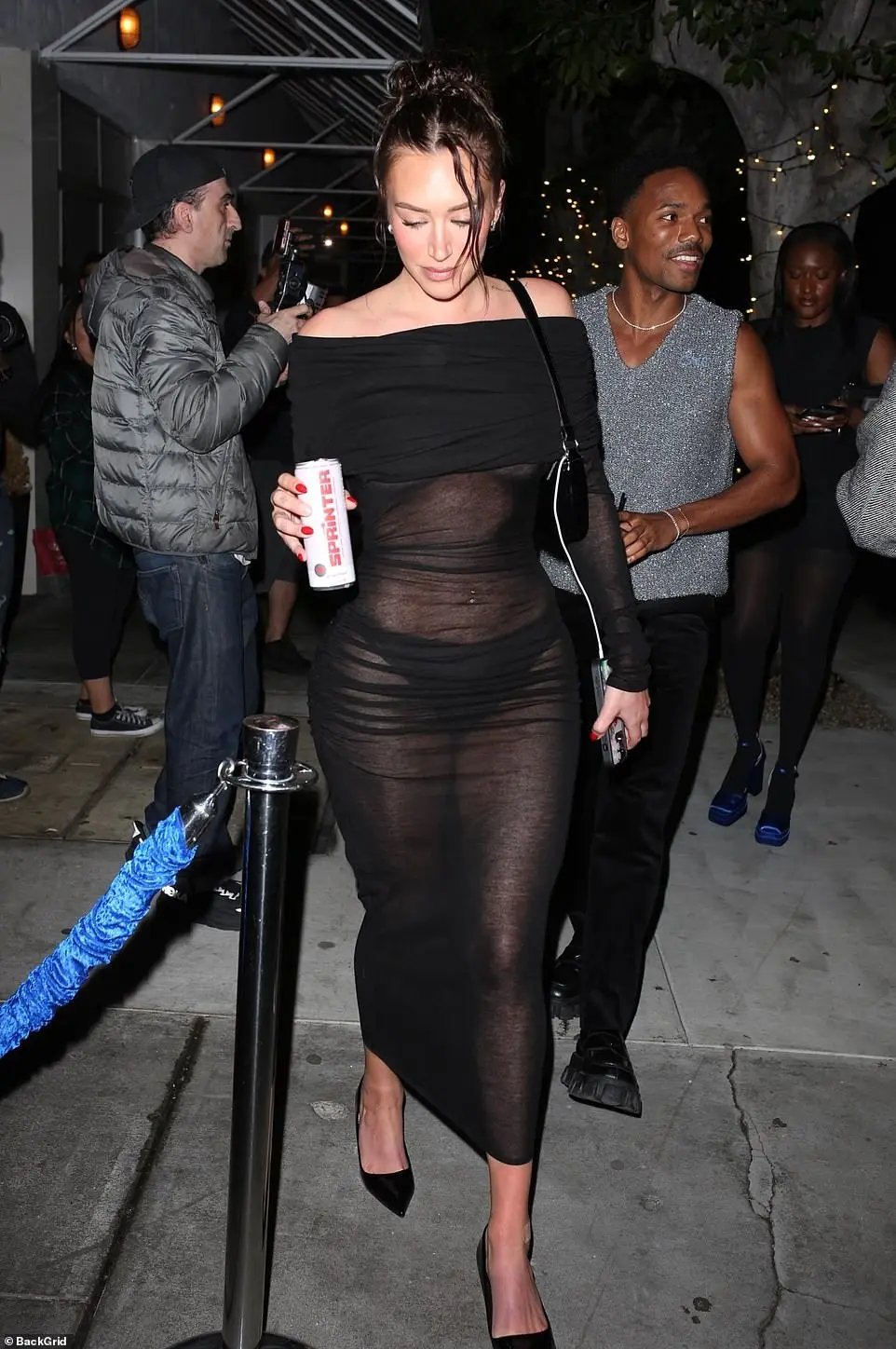 Her bikini-style underwear was visible and she appeared to be bra-free