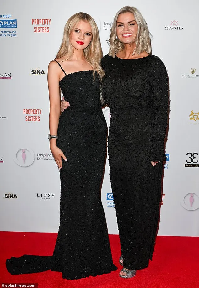 Kerry brought her lookalike daughter Heidi along and she stunned in a similarly shimmering black dress with a train