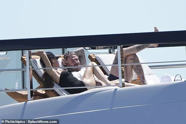 She sunbathed on the top deck alongside her husband while yacht staff attended to her every need