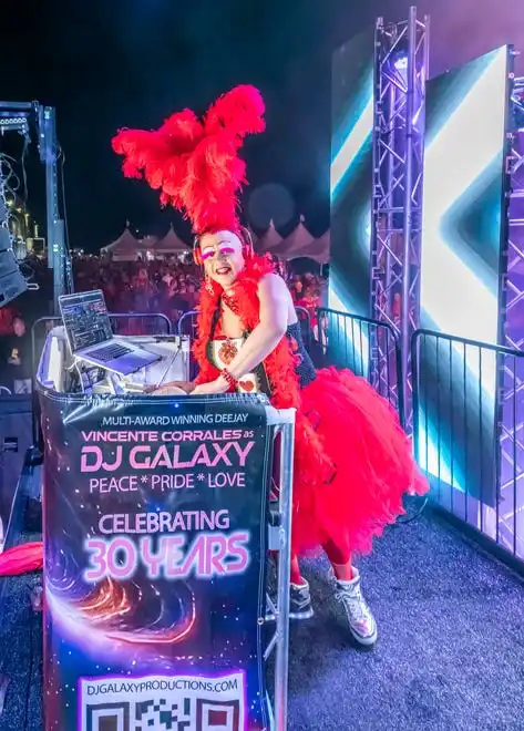 DJ Galaxy (aka Vincent Corrales) kept the dance floor moving at the LGBTQ Community Center of the Desert's Red Dress/Dress Red Party in Palm Springs, Calif., on March 16, 2024.