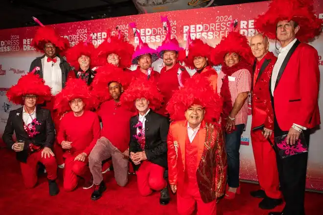 Representatives from presenting sponsors Contractors State License Schools and Contractor Insurance Agency (and friends) pose at the LGBTQ Community Center of the Desert's Red Dress/Dress Red Party in Palm Springs, Calif., on March 16, 2024.