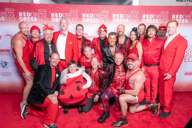 Scarlet sponsors Glenn Johnson, Michael Melancon and Alex Schalasky pose with friends at the LGBTQ Community Center of the Desert's Red Dress/Dress Red Party in Palm Springs, Calif., on March 16, 2024.