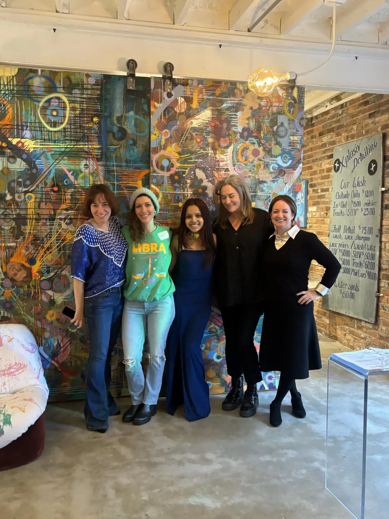 The Race to the Prom clothing giveaway was organized by Carolina Braunschweig on the far left, and Beth Vantosh ( second from right ) donated her room for the pop-up shop, which was staffed by a devoted army of volunteers.