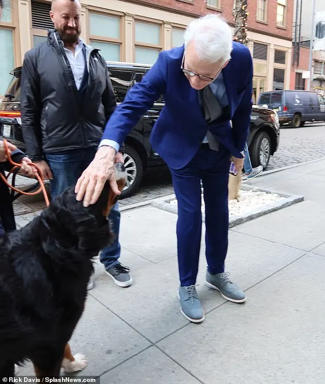 Steve stopped to pet a dog as he headed out of his car