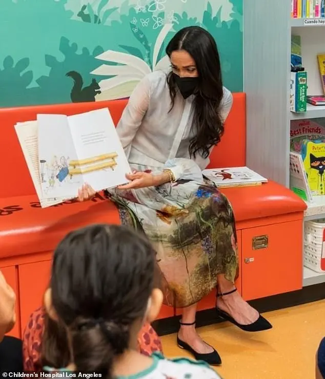 Meghan Markle put on a typically stylish display in a floral dress from Oscar De La Renta as she visited Children's Hospital Los Angeles on 21 March