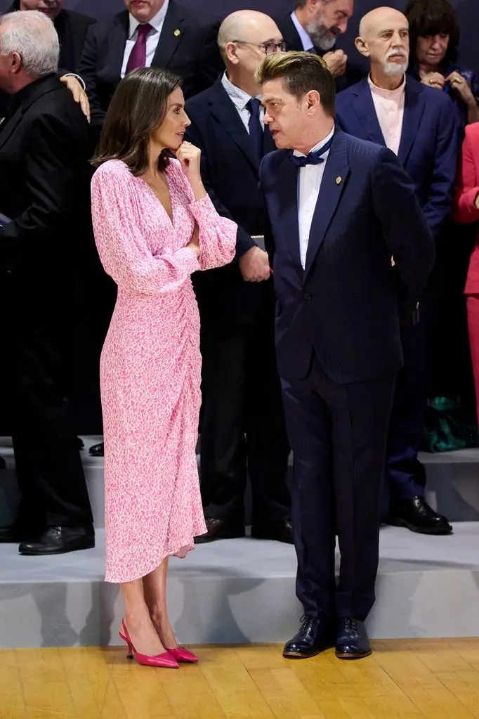 Queen Letizia talking to Spanish singer Santiago Auseron