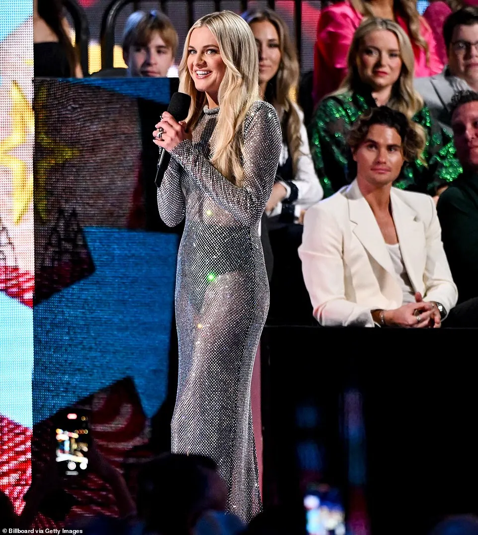 Kelsea opted for minimal accessories to allow the outfit to be the main focal point, and added a few chunky rings onto each of her hands