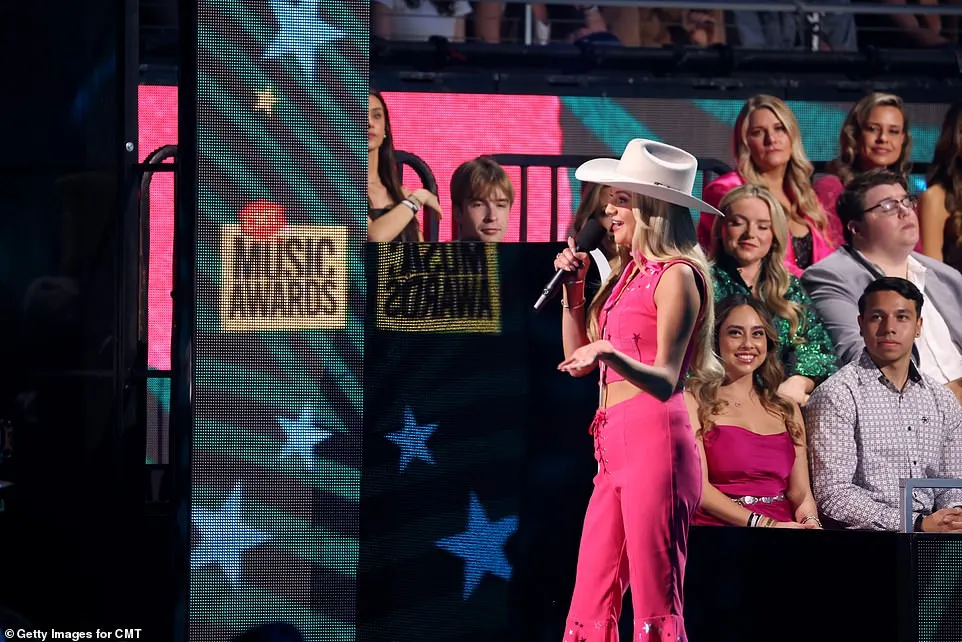 While talking to the audience, the beauty said of the movie: 'I've watched it so many times! I need a sequel, and I think I have the perfect idea for it. I want to see country Barbie!'