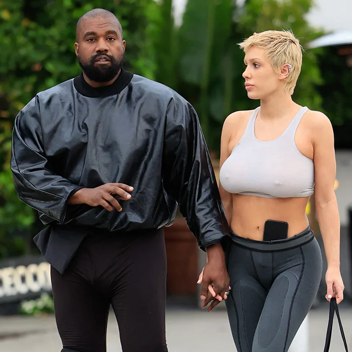 Kanye West holding hands with wife Bianca Censori