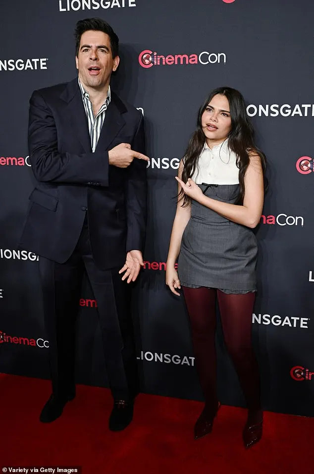 Director and screenwriter Eli Roth, 51, joined Ariana on the carpet