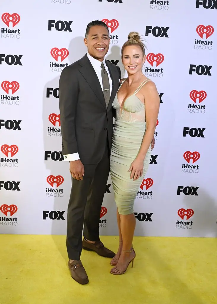 T. J. Holmes and Amy Robach at the 2024 iHeartRadio Music Awards held at the Dolby Theatre on April 1, 2024 in Los Angeles, California.