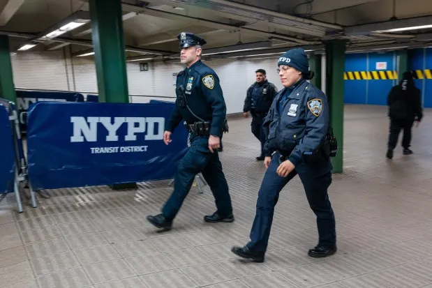 NEW YORK, NEW YORK - MARCH 06: NYPD officers patrol a subway station on March 06, 2024 in New York City. Following a surge in crime on the subways, New York Governor Kathy Hochul revealed a five-point plan to bring state resources, the deployment of 750 National Guard members and 250 New York State and MTA police officers, into the subway system. Violence in the subway system, the nation's largest, has surged this year over last. (Photo by Spencer Platt/Getty Images)