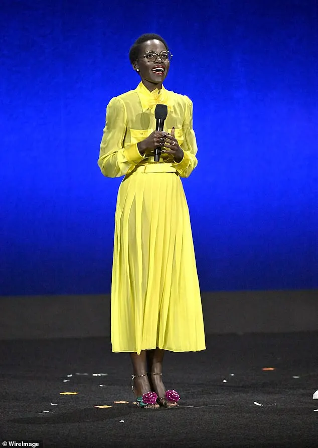 Lupita beamed as she spoke about the film in her eye-catching yellow dress with a flowing midi skirt ahead of its release in September