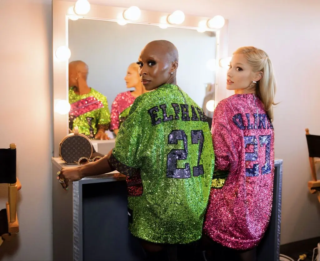 ariana and cynthia showing names on back of jerseys