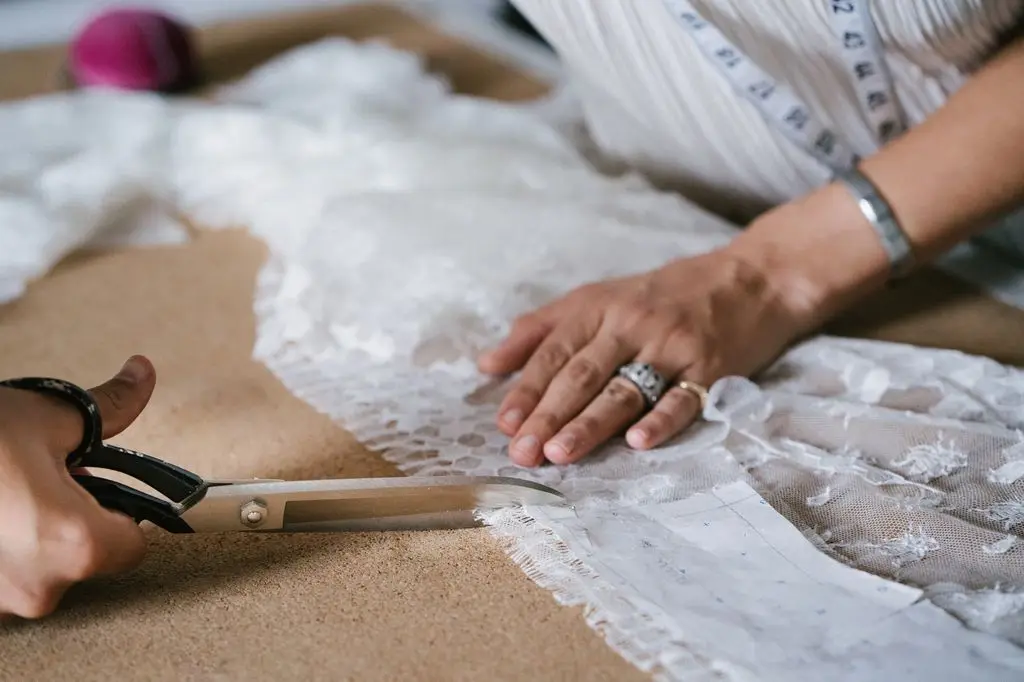 Haute couture designer making wedding gown