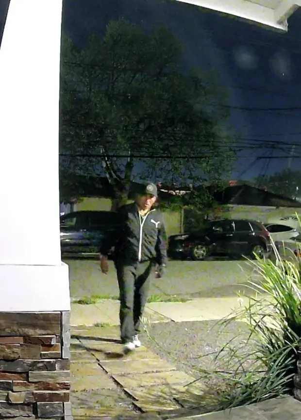 The Redwood City Police Department is seeking the public's help in identifying the person pictured in this image. The person is suspected of stealing a package containing a $2,000 wedding dress from the doorstep of a home in the 800 block of Adams Street in Redwood City on April 11, 2024. (Redwood City Police Department)