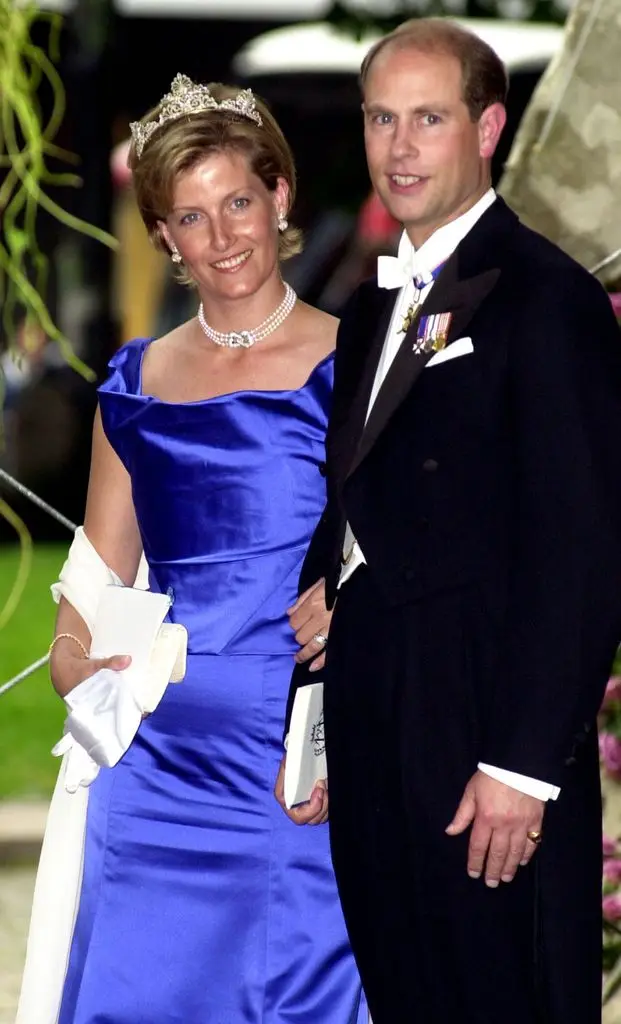 Duchess Sophie in a blue dress and a tiara with her husband Prince Edward