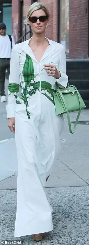 The 40-year-old socialite shined in an Oscar de la Renta cotton maxi dress while out for a stroll in the SoHo area