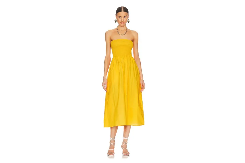 A woman in a yellow dress