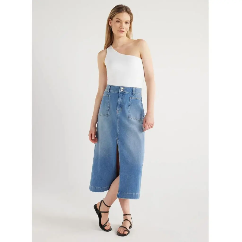 model wearing maxi denim skirt with white one shoulder top