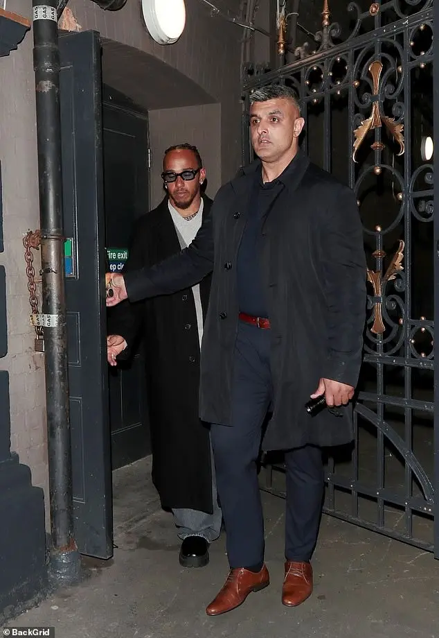 Lewis Hamilton was also present and he was wearing a rather subdued ensemble compared to his usual wacky looks, in a grey jumper and a dark jacket