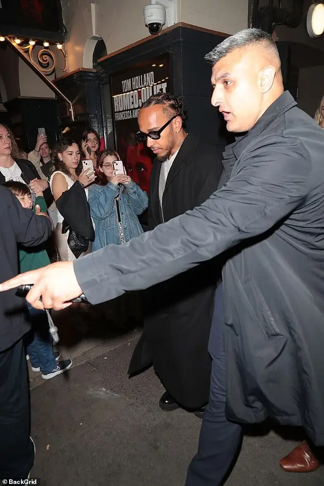 Lewis was being ushered out of the venue to his waiting car at the end of the night