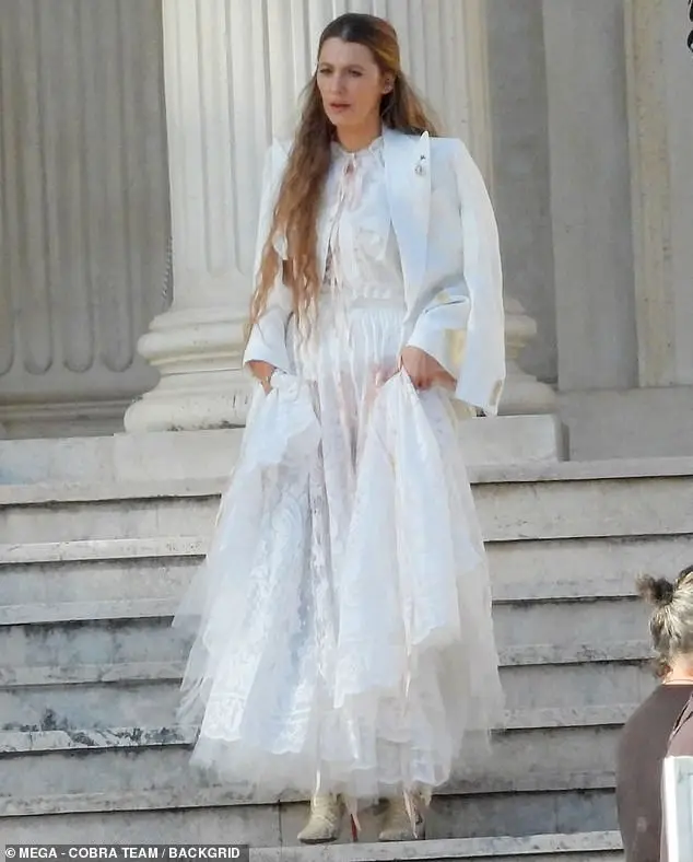 A few days earlier on Tuesday, Lively was also seen on set while sporting a different ensemble that comprised of a white gown that was made of both lace and tulle material