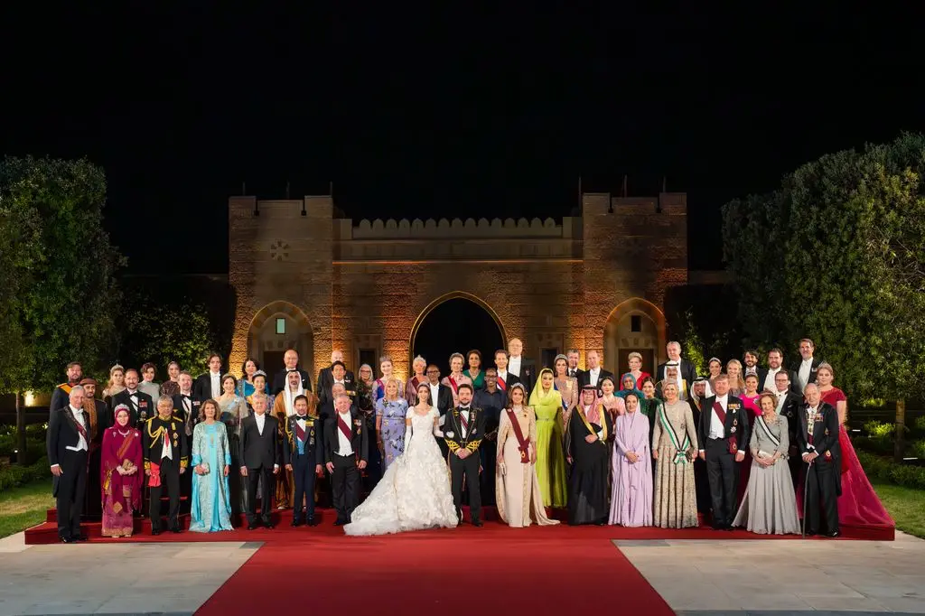 Princess Beatrice, Princess Kate and more royals posed for an official wedding photo at Prince Hussein and Princess Rajwa's state banquet